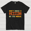 Don't Judge A Book By Its Movie  T-Shirt