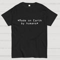 MADE ON EARTH BY HUMANS  T-Shirt