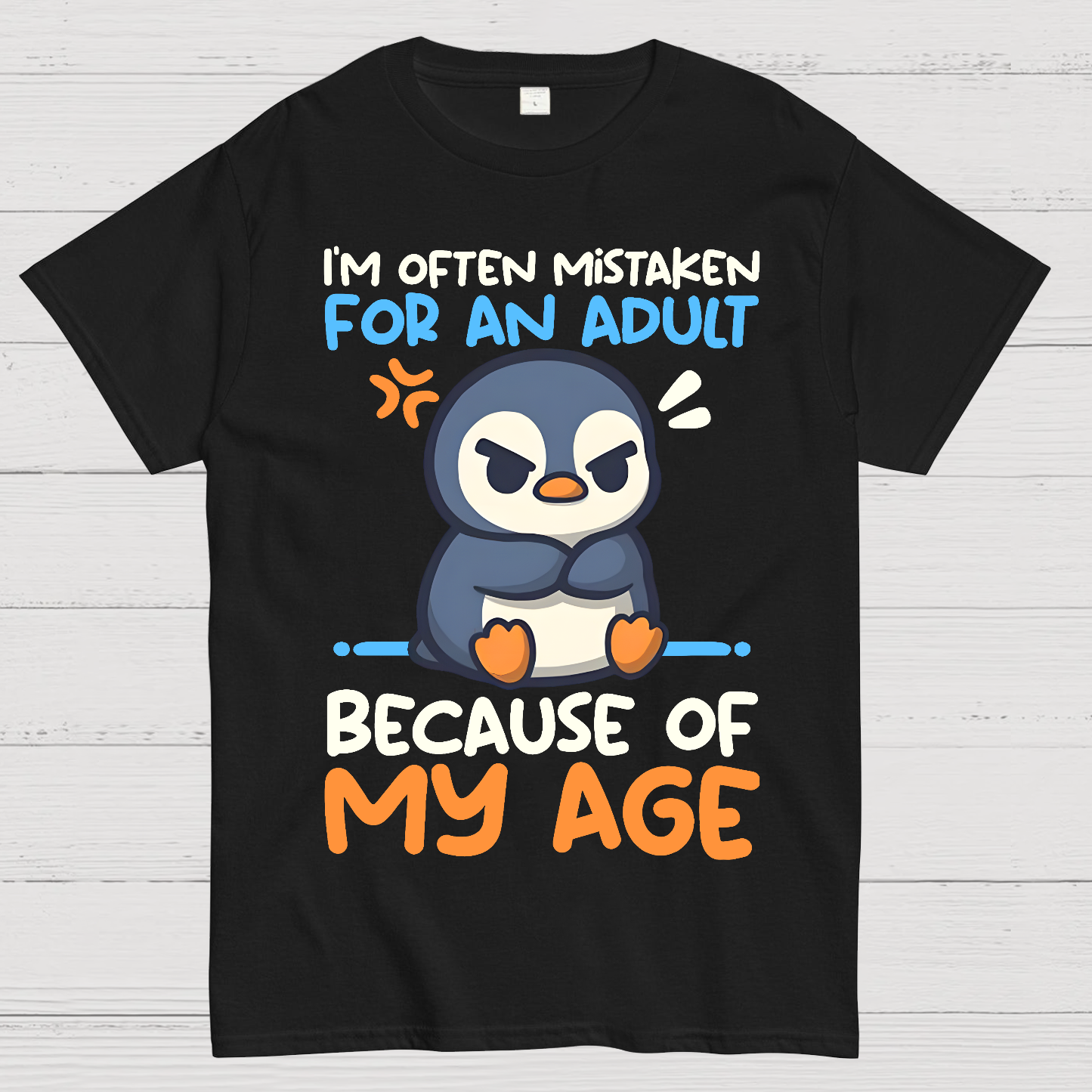 Penguin often mistaken for an adult  T-Shirt