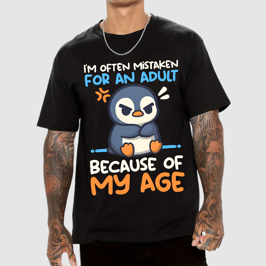 Penguin often mistaken for an adult  T-Shirt