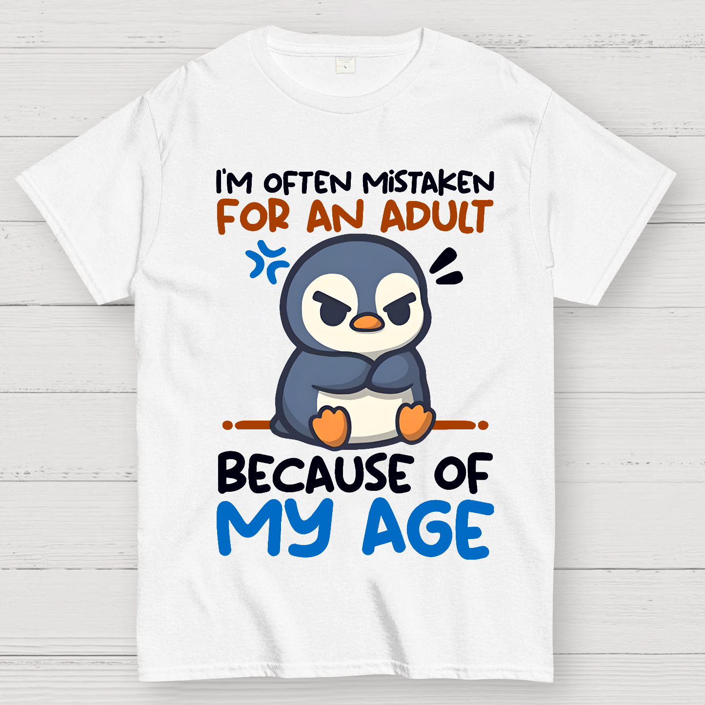 Penguin often mistaken for an adult  T-Shirt
